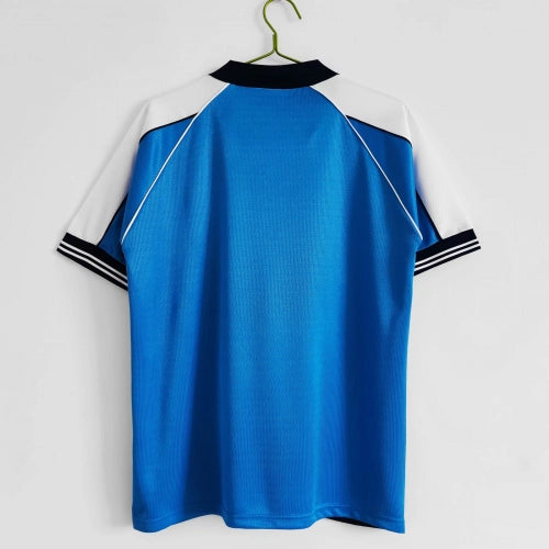 Camiseta de fútbol retro local del Manchester City 1999/01