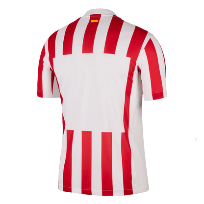 Camiseta de fútbol del Atlético de Madrid para la temporada 2025/26, roja y blanca.